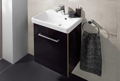 Mueble de tamaño reducido para pequeño lavabo en color negro